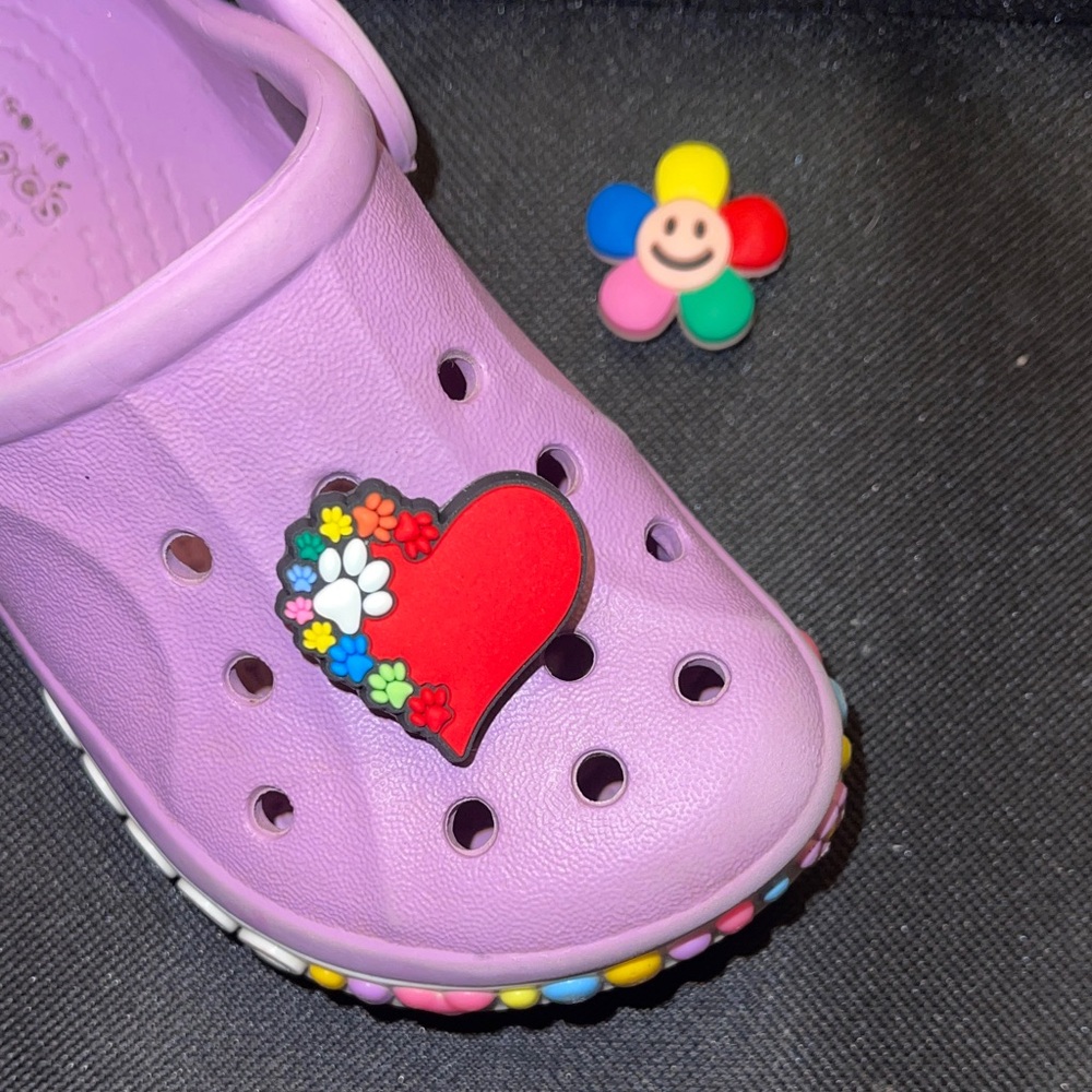 JIBBITZ CROC SHOE CHARMS! Shoe not included. 
1 Heart and 1 Flower!
